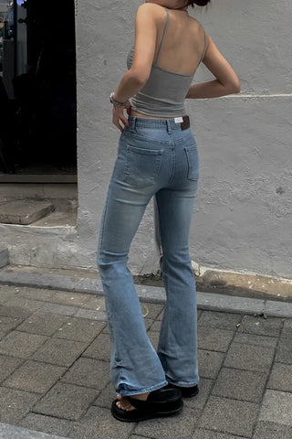Sleeveless top with built-in cap