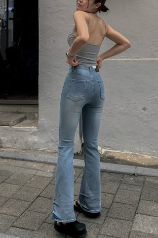 Sleeveless top with built-in cap