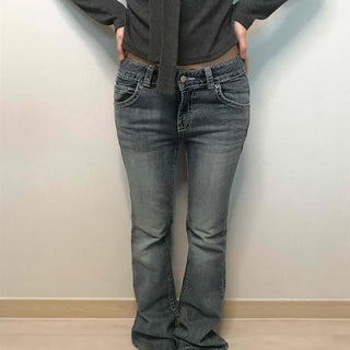 Low-rise bootcut washed denim pants
