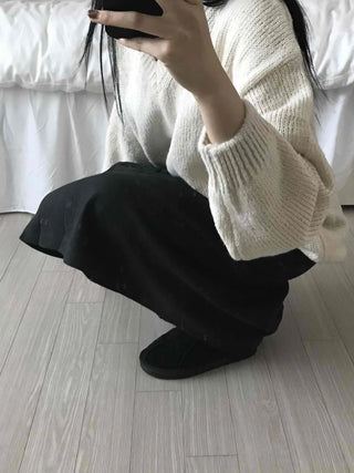 Simple contemporary balloon midi skirt