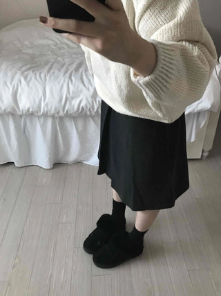 Simple contemporary balloon midi skirt