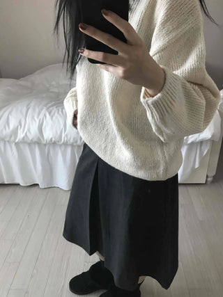 Simple contemporary balloon midi skirt