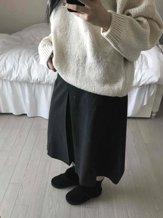 Simple contemporary balloon midi skirt