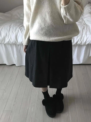 Simple contemporary balloon midi skirt