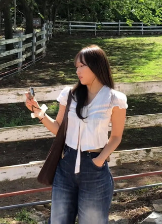 Kuri Petit Puff Ribbon Blouse