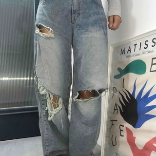 Damaged vintage denim long pants