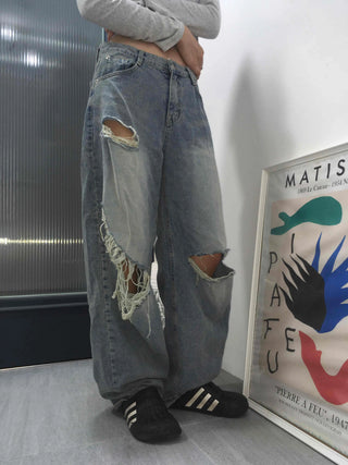 Damaged vintage denim long pants