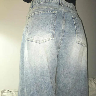 Damaged vintage denim long pants