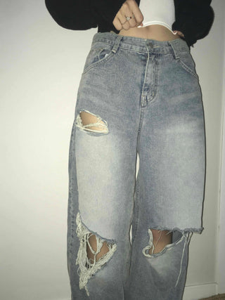 Damaged vintage denim long pants