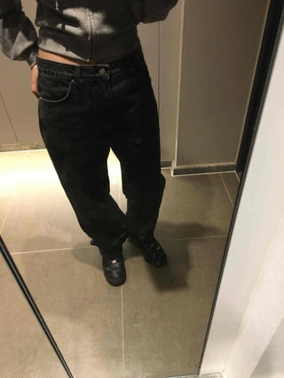 Dark-toned vintage washed loose-fit denim pants