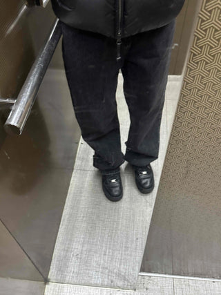 Dark-toned vintage washed loose-fit denim pants