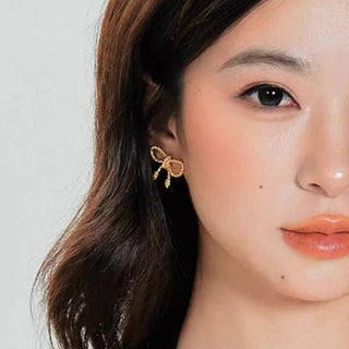 Braided bow earrings