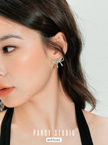 Braided bow earrings