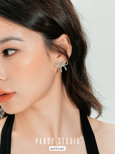 Braided bow earrings