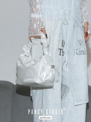 Smooth cream pleated handbag