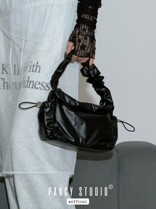 Smooth cream pleated handbag