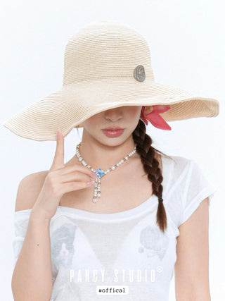 button straw hat