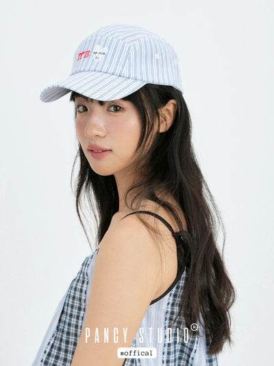 striped baseball cap