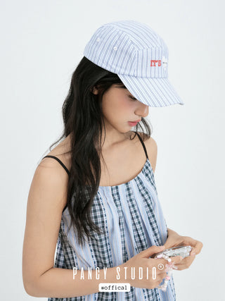 striped baseball cap