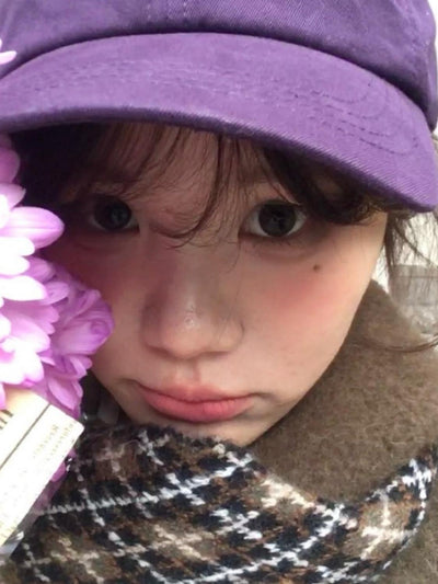 purple baseball cap
