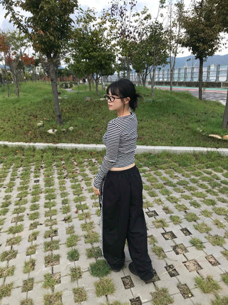 Minimalist button-punched striped T-shirt