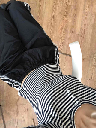 Minimalist button-punched striped T-shirt