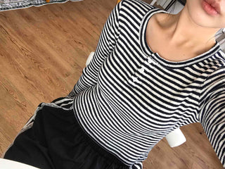 Minimalist button-punched striped T-shirt