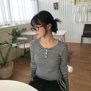 Minimalist button-punched striped T-shirt
