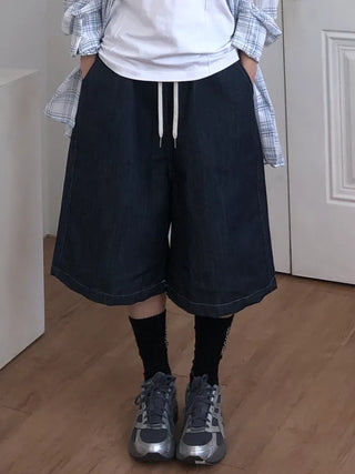 Tisci Raw Denim Bermuda Pants