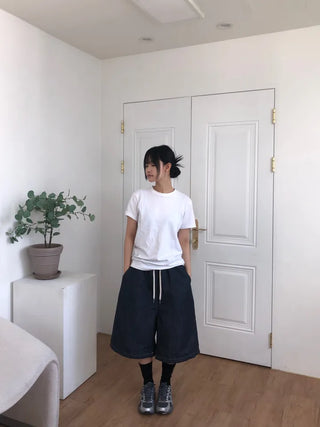 Tisci Raw Denim Bermuda Pants