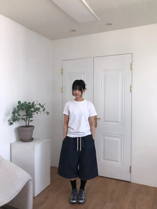 Tisci Raw Denim Bermuda Pants