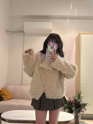 High-neck diagonal midi-length fur jacket