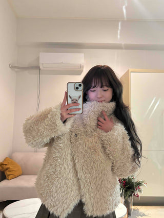 High-neck diagonal midi-length fur jacket