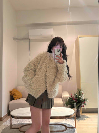 High-neck diagonal midi-length fur jacket