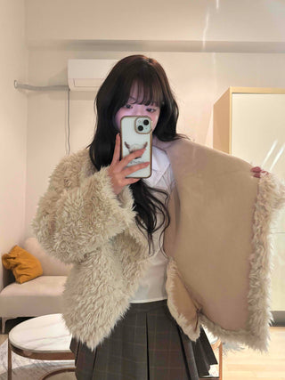 High-neck diagonal midi-length fur jacket