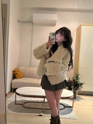 High-neck diagonal midi-length fur jacket