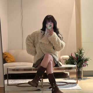 High-neck diagonal midi-length fur jacket