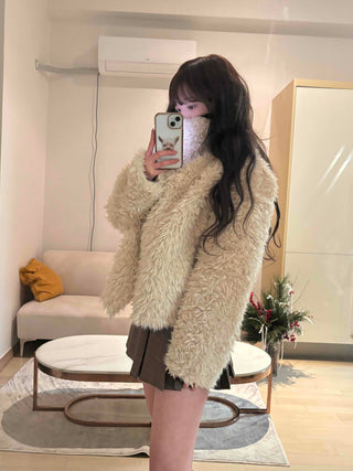 High-neck diagonal midi-length fur jacket