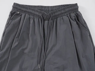Crisp Nylon Rivet Elastic Waist Long Pants