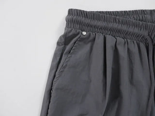 Crisp Nylon Rivet Elastic Waist Long Pants