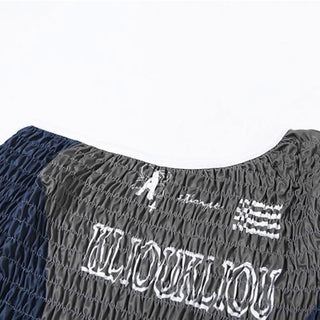 Smocked long sleeve irregular letter pattern ruffle top