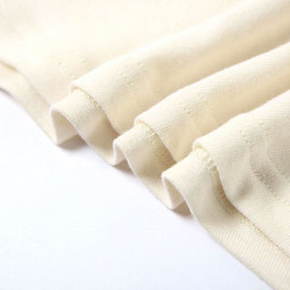 Crewneck irregular hollow out sleeveless solid cut out top