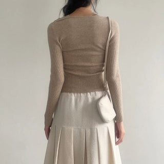 Asymmetrical off-shoulder knitted top