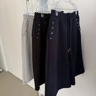 Pocket eyelet Bermuda shorts, terry studded elastic band shorts