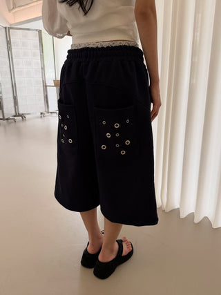 Pocket eyelet Bermuda shorts, terry studded elastic band shorts