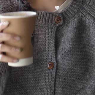 Thick round neck tone-down color knit cardigan