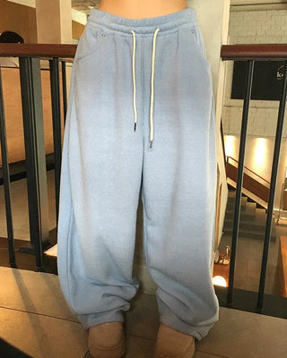 Fleece-lined wide-leg sweatpants with pockets