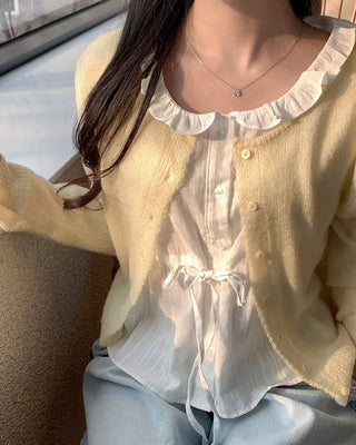 Punched ruffle long-sleeve blouse