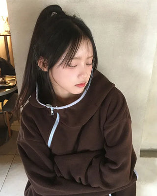 Two-tone hooded quarter-zip parka