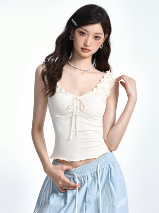 Slim textured edge knot top